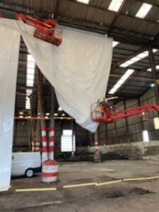 pose de filets avec nacelles élévatrices sécurisation de chantier